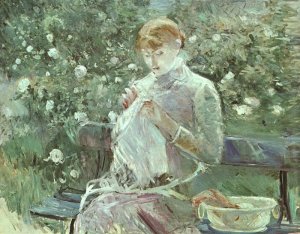 Young Woman Sewing In A Garden