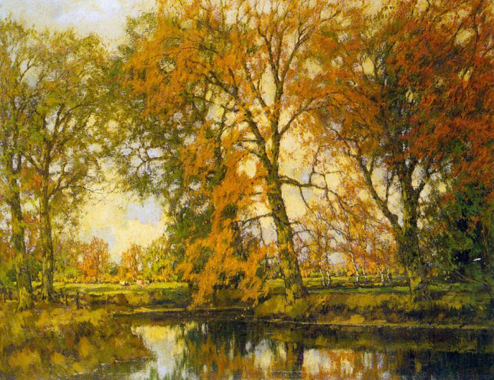 An Autumn Landscape With Cows Near A Stream